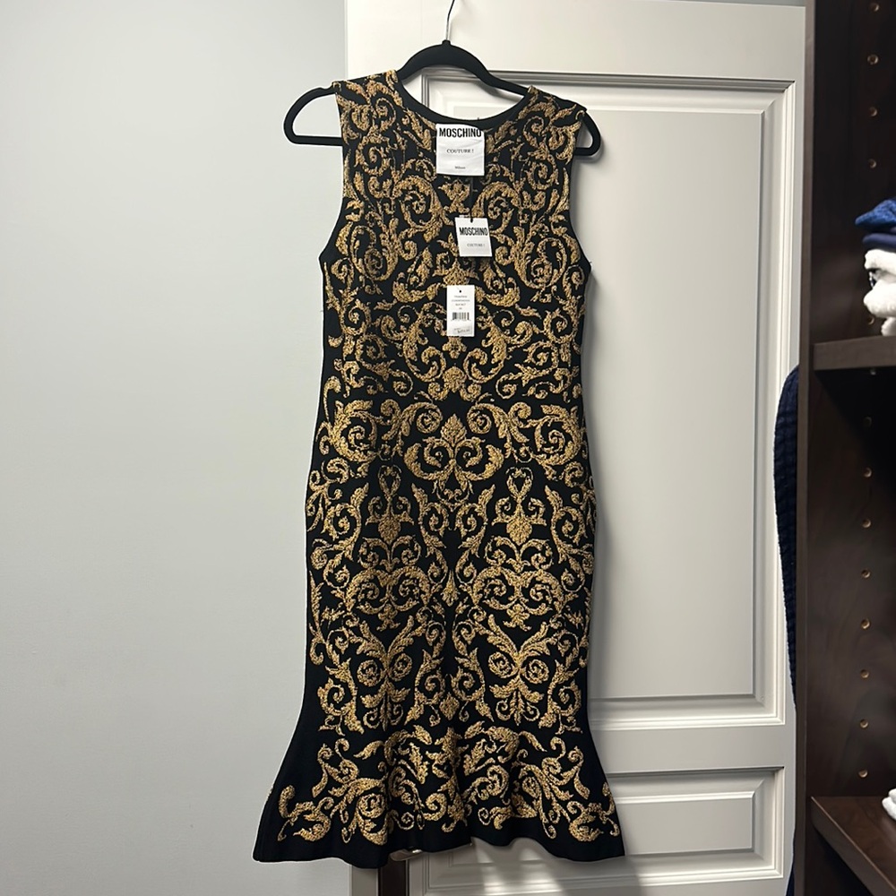 Black and gold jacquard knit moschino couture dress.
